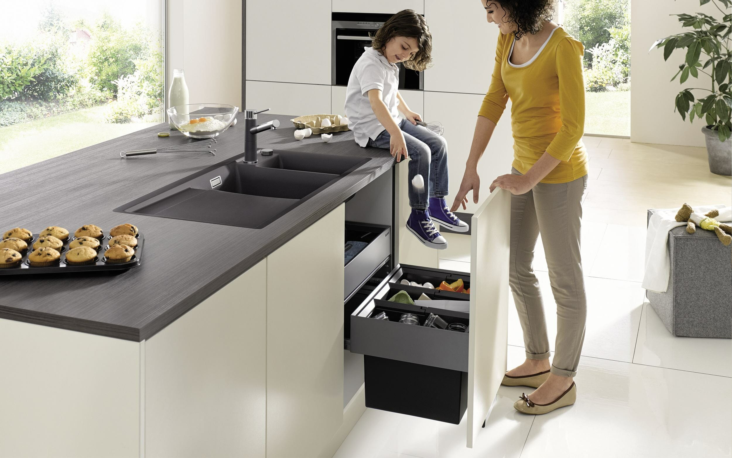 Integrated kitchen bins