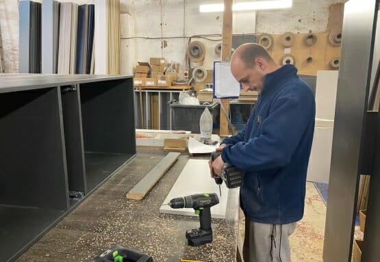 Mastercraft Kitchens technician assembling bespoke kitchen cabinets at our in-house manufacturing facility
