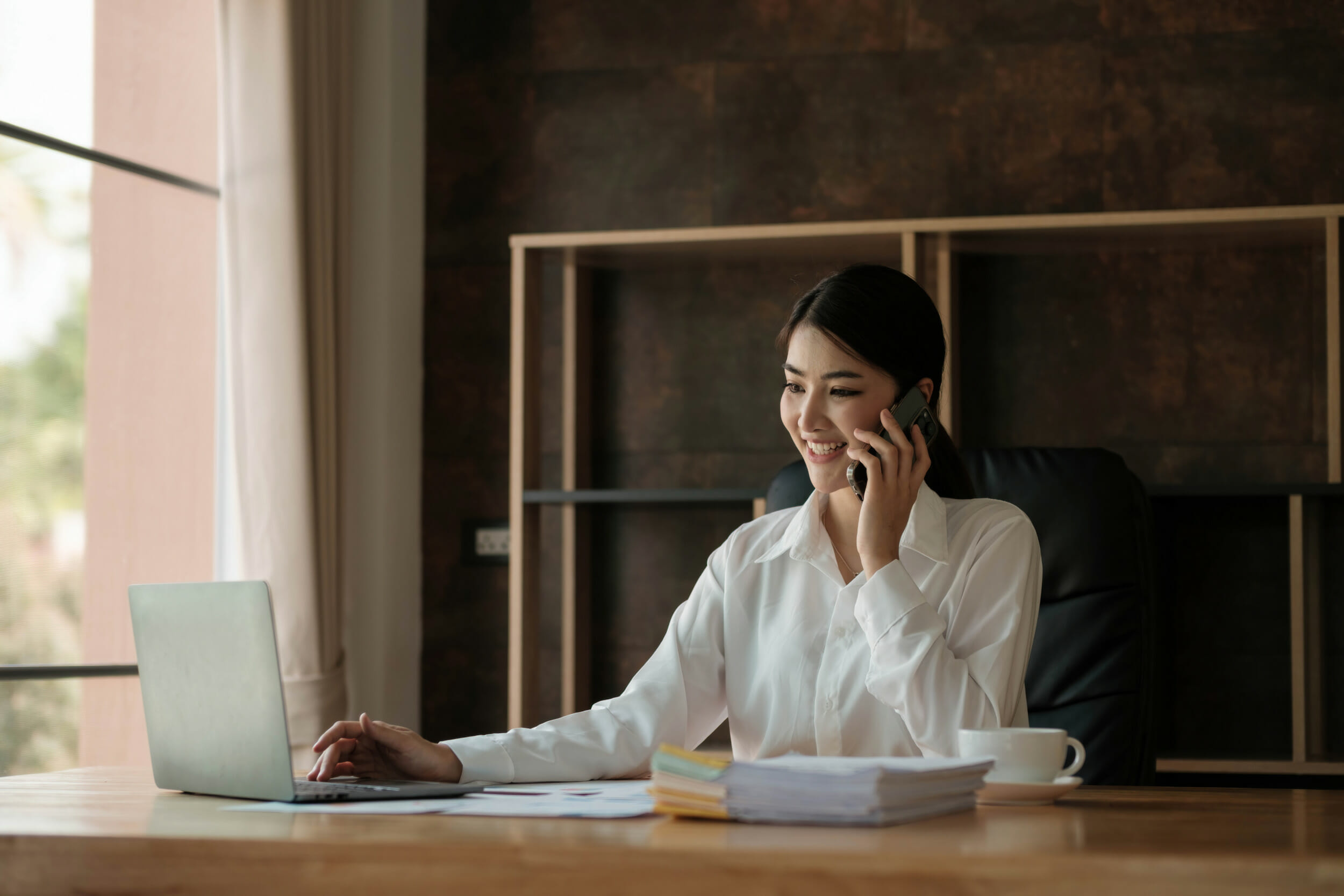 Business woman using calculator for do math finance on wooden desk in home and business working background, tax, accounting, statistics and analytic research concept..