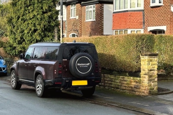 Mastercraft Kitchens designer vehicle outside a customer home for a kitchen design visit