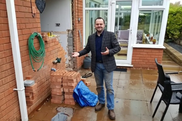 Mastercraft's designer Simon inspecting his brickwork