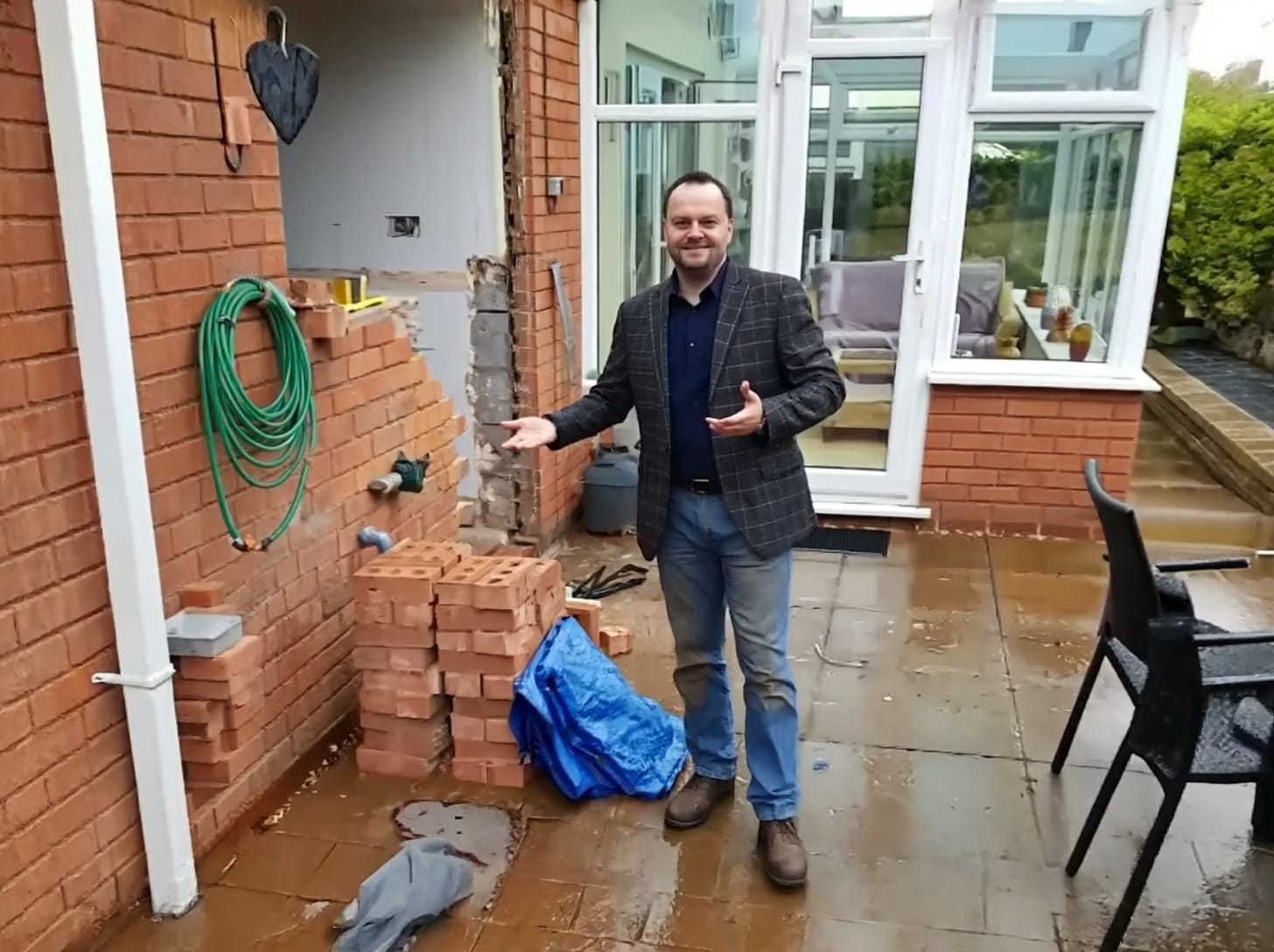 Mastercraft's designer Simon inspecting his brickwork