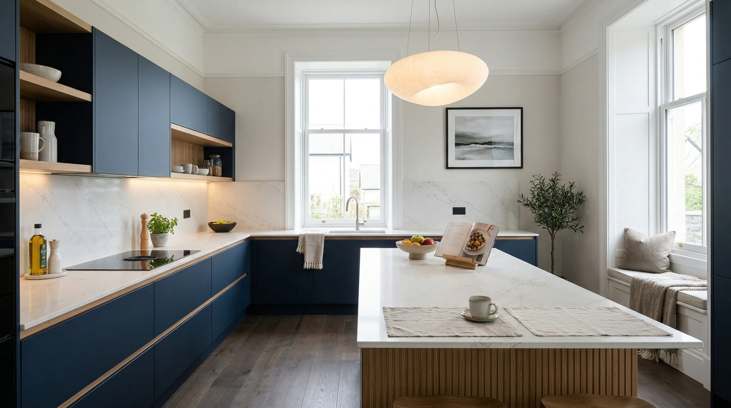 Wide view of a newly completed bespoke Mastercraft kitchen, contemporary painted lay-on cabinetry in willow tones