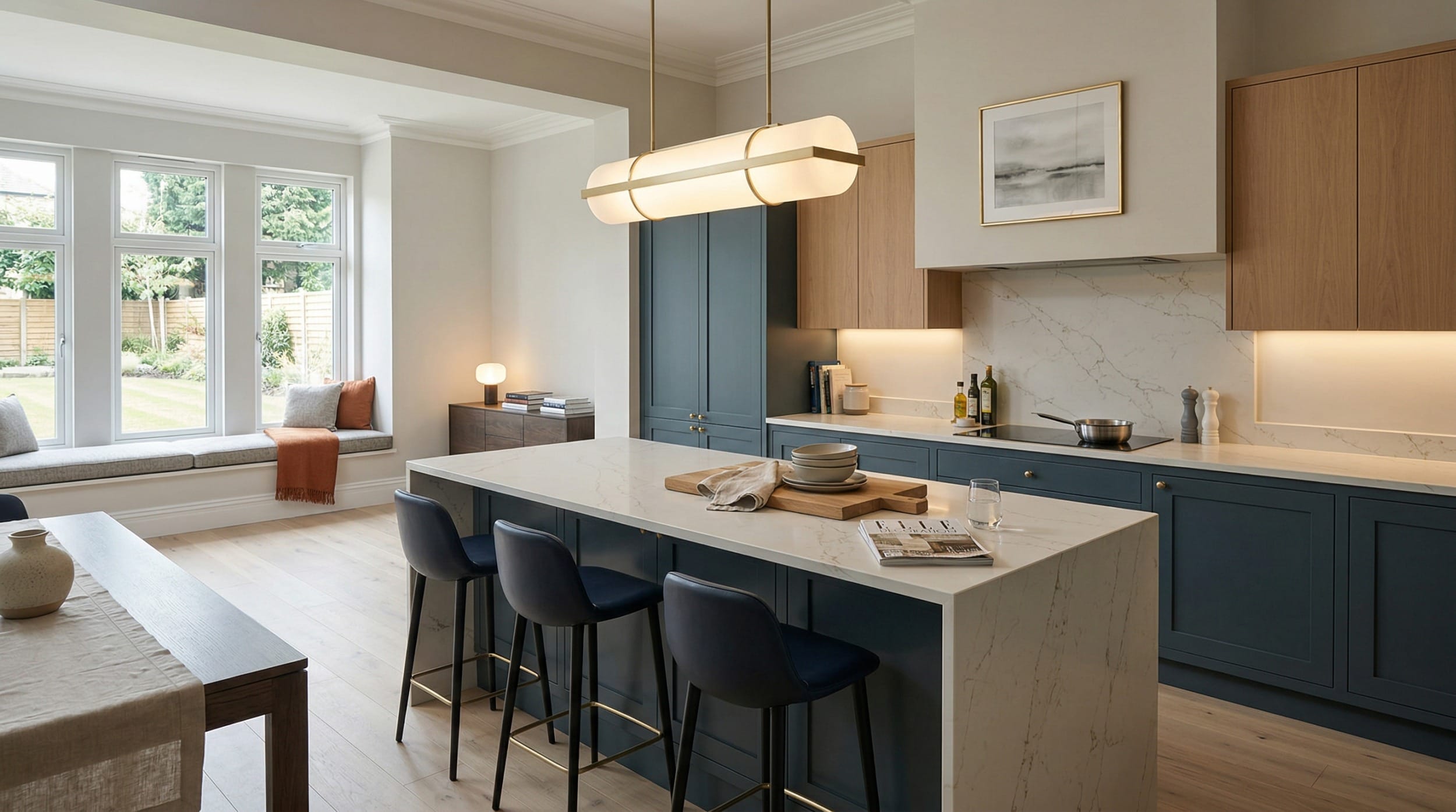 Wide view of a bespoke Mastercraft kitchen, timber veneer slab-door cabinetry in light teal tones