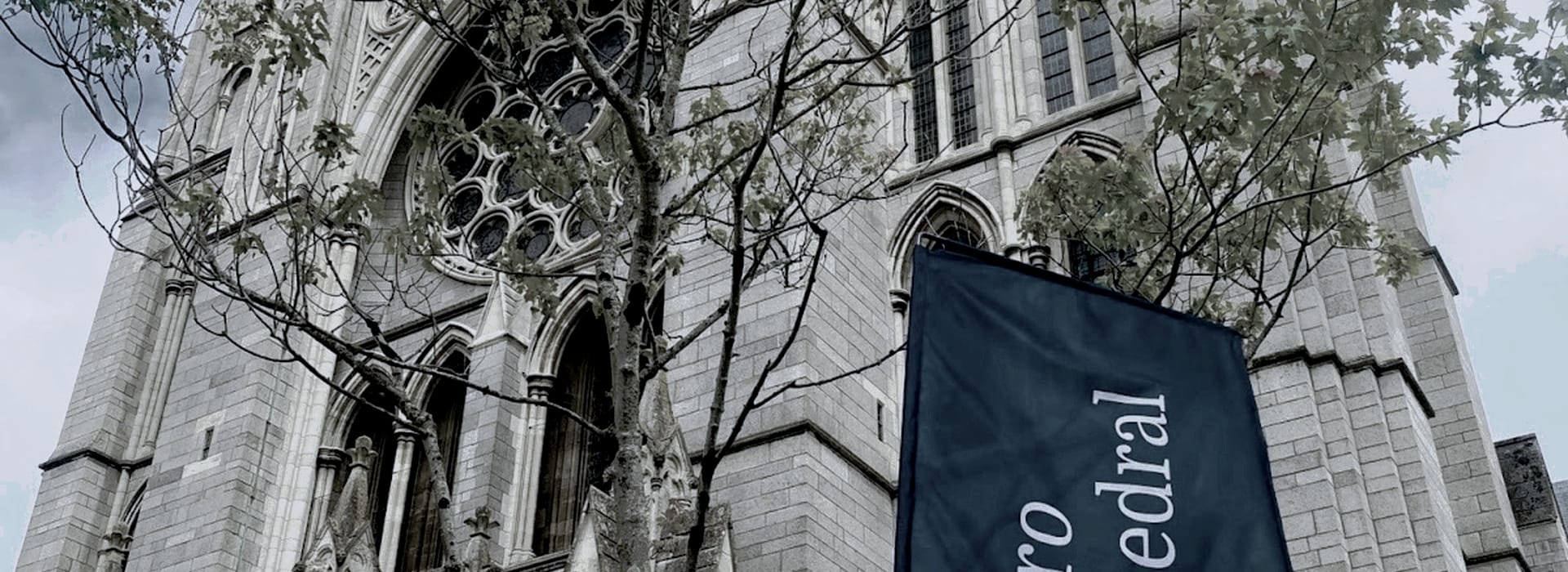 Bespoke Kitchens Truro - Mastercraft Kitchens Gothic stone church facade with arched windows and circular stained glass