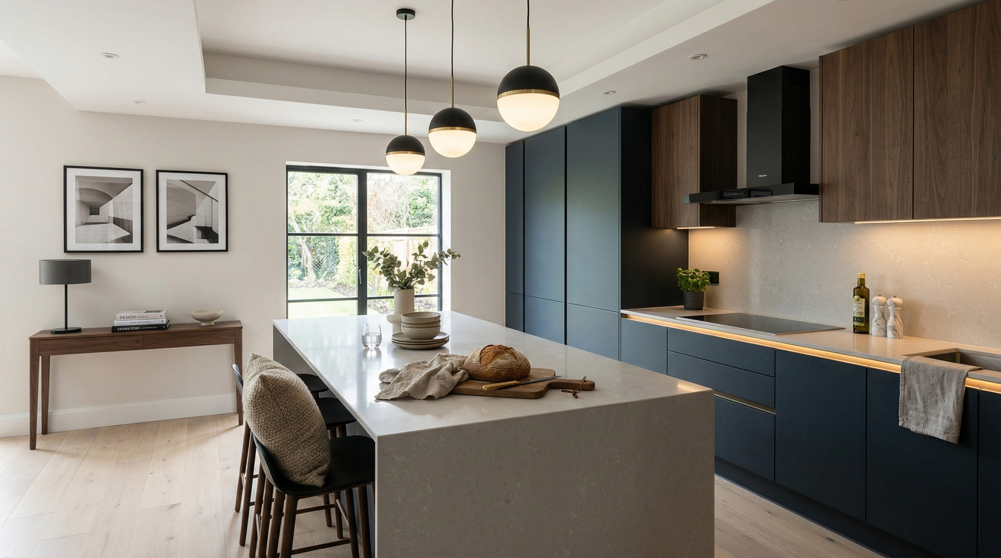 Wide view of a newly completed bespoke Mastercraft kitchen, modern shaker cabinetry in light grey tones